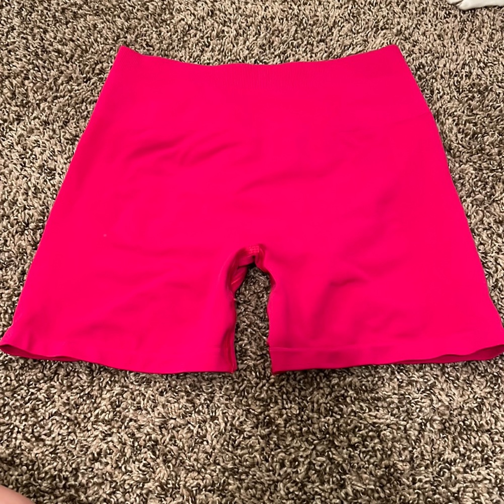 Alphalete Amplify Short 4.5” in the color Pink; size medium